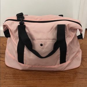 Pink duffle bag